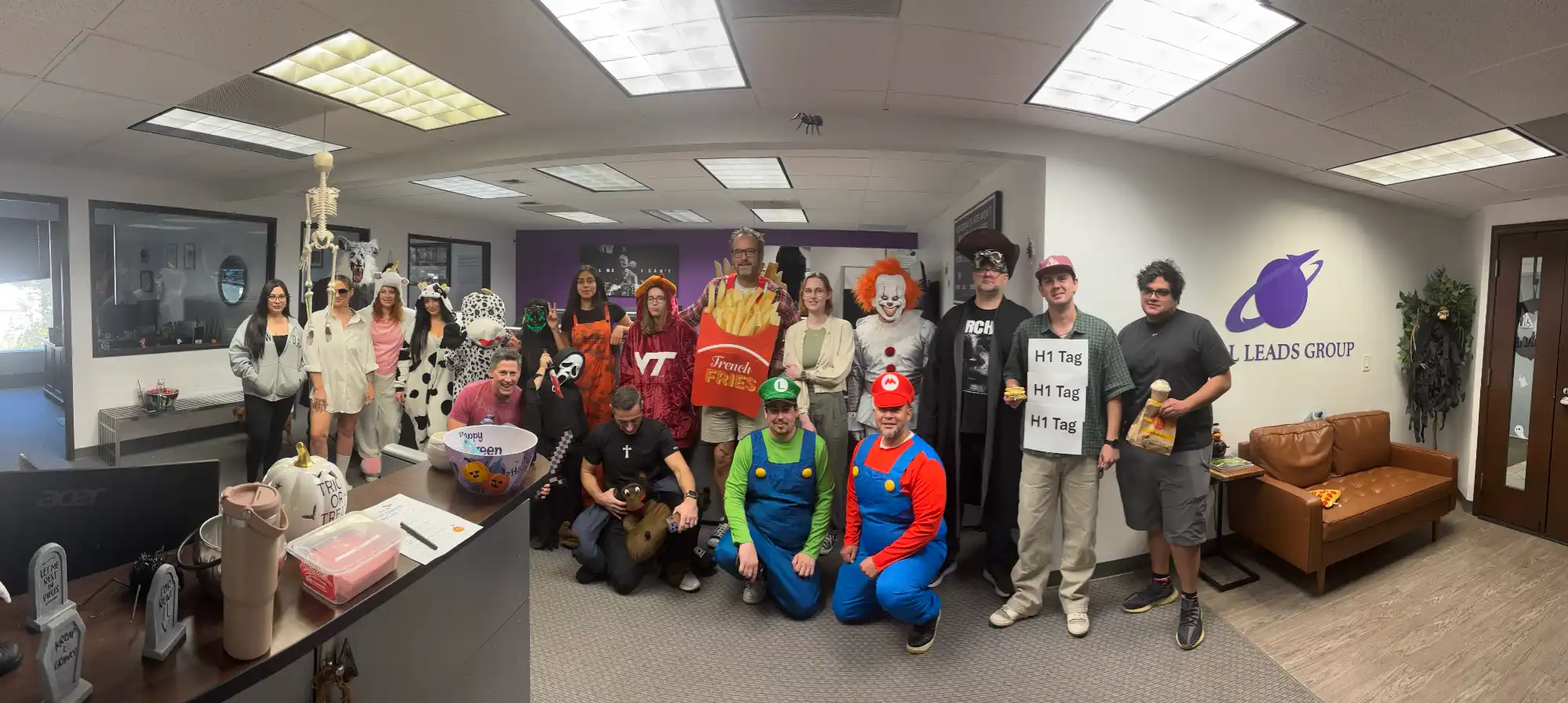 large group posing in costumes