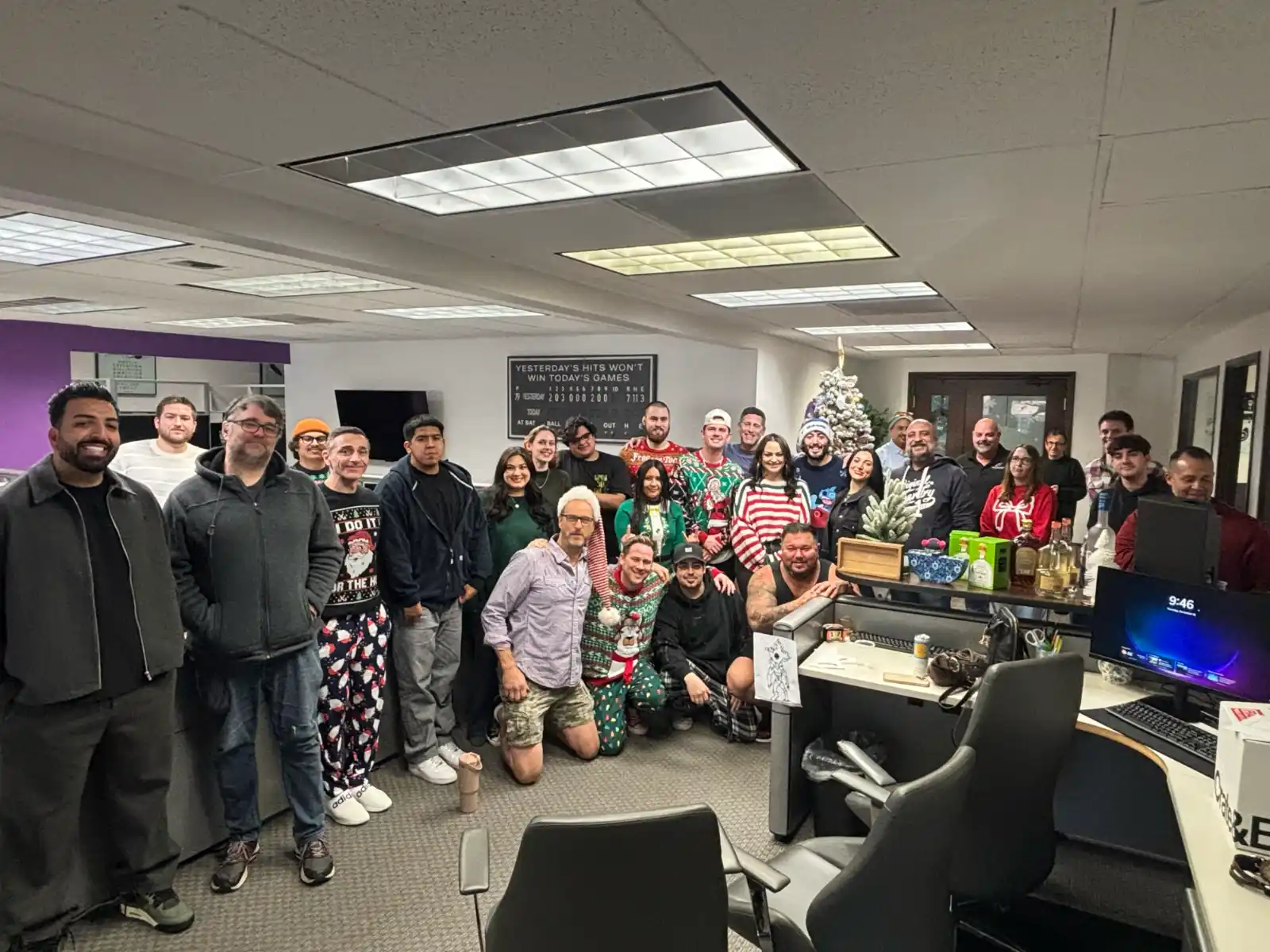 group poses in the office